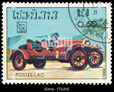 BUDAPEST, HUNGARY - 18 march 2016:  a stamp printed in Laos shows vintage car, Nazzaro, circa 1984 Stock Photo
