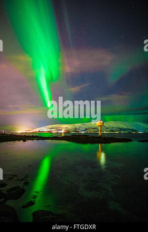 Northern lights - Aurora borealis dancing in the night sky Stock Photo ...