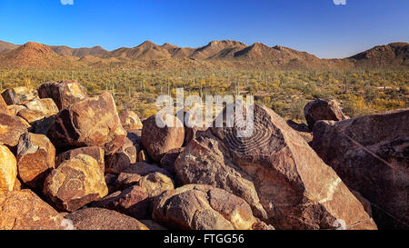 Hohokam petroglyphs on rocks on the top of Signal Hill in Saguaro National Park Stock Photo