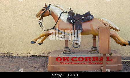 Coin-operated horse ride runs at the OK Corral in Tombstone, Arizona Stock Photo