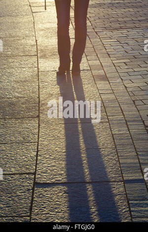 03/26/2016 Russia, Moscow. A series of 'Walking in Moscow. Moscow and faces.'The geometrical pattern of paving slabs and the sha Stock Photo