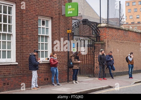 People outside Job Centre Plus office at Whitechapel, London England United Kingdom UK Stock Photo