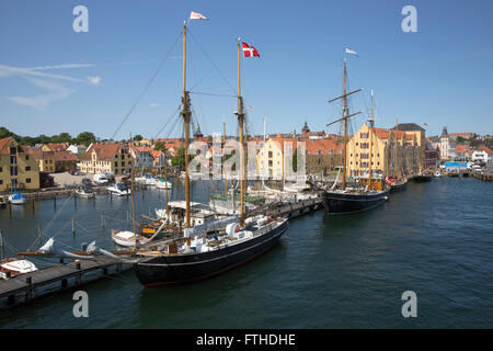 Sailing ships of Fionia and Havet docked in the Danish seaport of Svendborg, Denmark Stock Photo