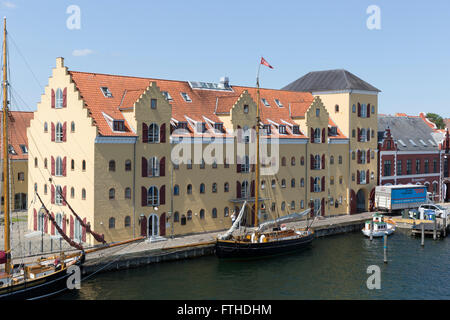 Historic buildings and the moored ship Viking in the harbor of Svendborg, Denmark Stock Photo