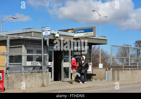 two-men-talk-while-waiting-at-