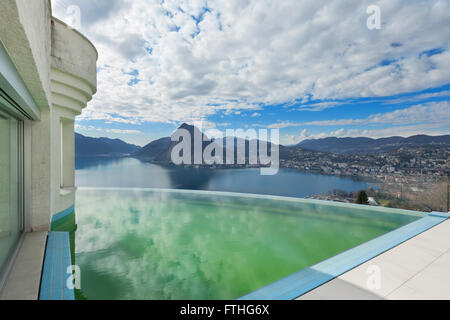 Architecture, beautiful landscape from a modern house with infinity pool Stock Photo