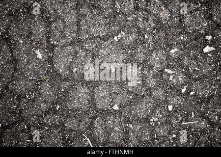 Texture of old gray cracked asphalt Stock Photo