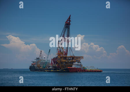 Oil rig lifting for installation on its jacket Stock Photo