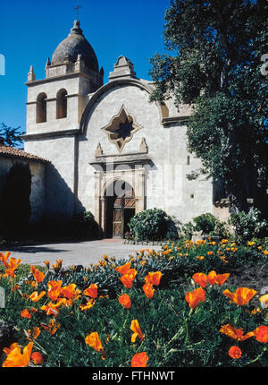 The Basilica Church of Mission San Carlos Borromeo de Carmelo was founded in 1771 by Father Junipero Serra in what is now Carmel, California, USA. The fabled Spanish priest who was a Franciscan friar became a Catholic saint when canonized by Pope Francis in September, 2015. The Carmel mission was the second of 21 California missions established up and down the state; it was one of nine founded by Saint Serra. He died there in1784 at the age of 70 and is buried under the sanctuary floor. Stock Photo