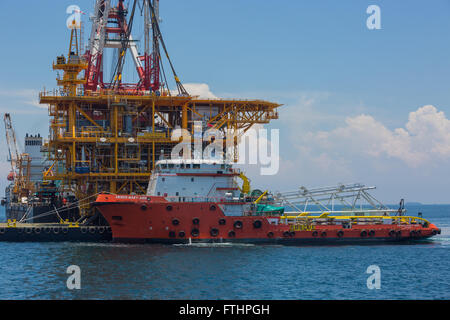 Oil rig lifting for installation on its jacket Stock Photo