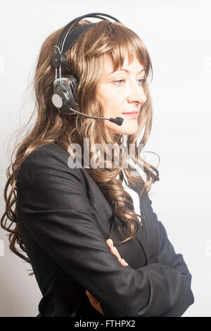 Support phone operator in headset on white background Stock Photo