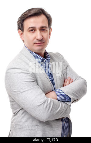 Portrait of smiling young business man in white coat Stock Photo