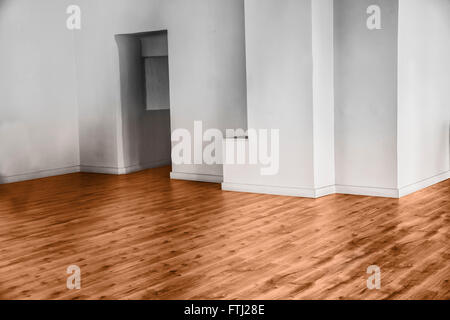 View of empty unfurnished room with parquet and white walls Stock Photo