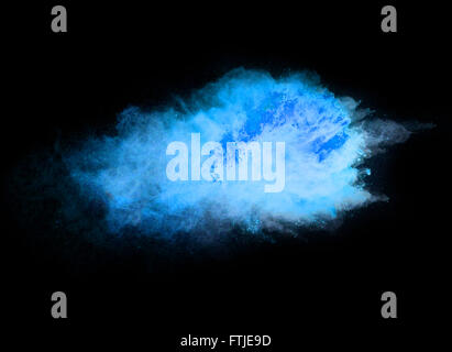 Explosion of blue powder on black background Stock Photo