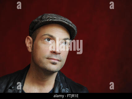 FILE - A file picture dated 12 October 2011 shows German jazz singer Roger Cicero posing during an interview in Berlin, Germany. Cicero died aged 45, his management confirmed on 29 March 2016 to German news agency Deutsche Presse-Agentur. Photo: JENS KALAENE/dpa Stock Photo