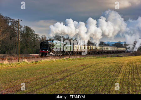 West Somerset Railway, The 9F Hauling The Pines Express Along Watersmeet. Just leaving Bishops Lydeard.