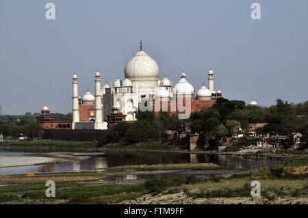 Mausoleum Taj Mahal seen from the Agra Fort - Jamuna or Yamuna River in foreground Stock Photo