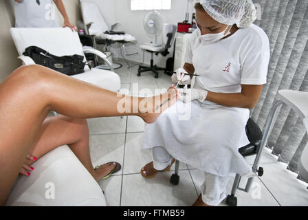 Manicure and pedicure nails making a customer Stock Photo