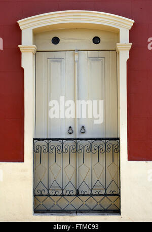 Window houses the city of Sao Luis Stock Photo