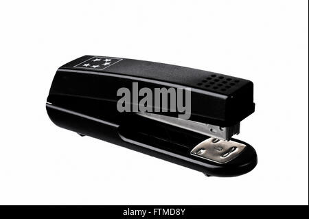 Black plastic stapler. Stock Photo