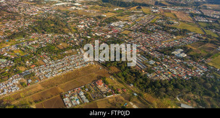 ALAJUELA, COSTA RICA - Aerial view of housing and farming. Stock Photo