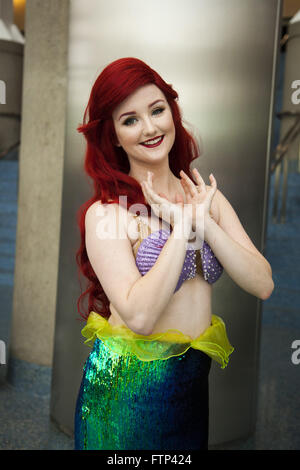 Woman dressed as Ariel from The Little Mermaid, Wondercon, Los Angeles Convention Center, downtown Los Angeles, California, USA Stock Photo