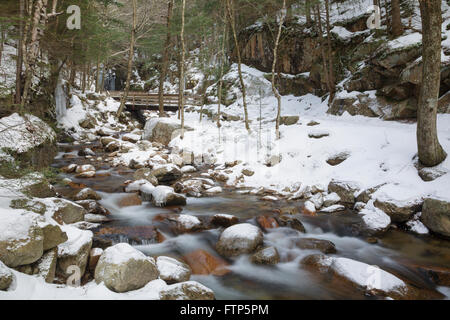 Franconia Notch State Park -Flume Brook at Flume Gorge in Lincoln, New Hampshire USA during the winter months. Stock Photo