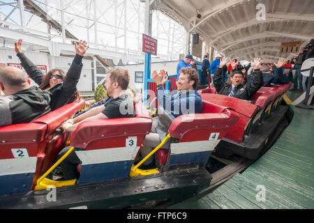 Politicians and invited guests on the first run on opening day of the Cyclone roller coaster in Coney Island in New York on Saturday, March 26, 2016. The opening of the world-famous iconic wooden roller coaster heralds the arrival of the summer season.  (© Richard B. Levine) Stock Photo