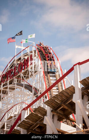 Coaster enthusiasts on opening day of the Cyclone roller coaster in Coney Island in New York on Saturday, March 26, 2016. The opening of the world-famous iconic wooden roller coaster heralds the arrival of the summer season.  (© Richard B. Levine) Stock Photo