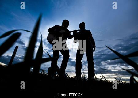 Bluegrass duo singing in a rural town Rolim de Moura Stock Photo