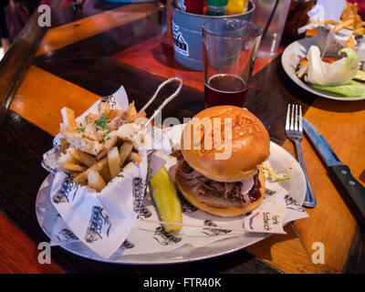 Pulled Pork sandwich at Fords Garage Restaurant in downtown Fort Myers on the Gulf Coast of Florida Stock Photo