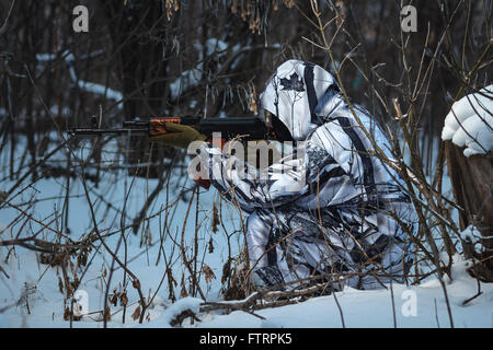 Soldier with the russian machine gun in snow Stock Photo