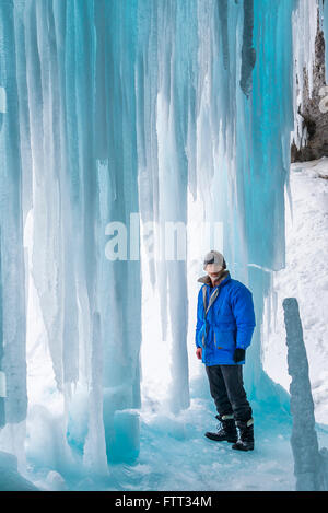 Behind the ice. Frozen Panther Falls, Banff National Park, Alberta, Canada Stock Photo