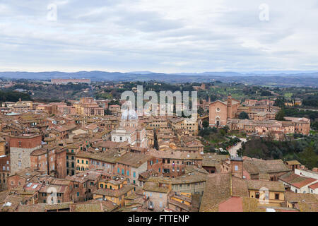 Insigne Collegiata di Santa Maria in Provenzano and Basilica di San Francesco in Siena, Italy.View from the Campanile del Mangia Stock Photo