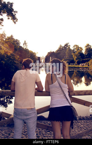 Young couple near pond Stock Photo
