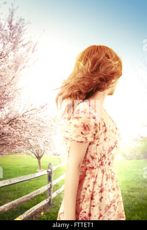 Woman on a windy spring day, looking away Stock Photo