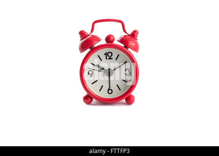 Red vintage alarm clock isolated on white background Stock Photo
