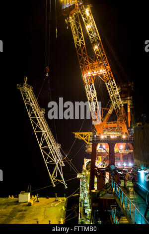 Oil torch installation on oil rig Stock Photo - Alamy