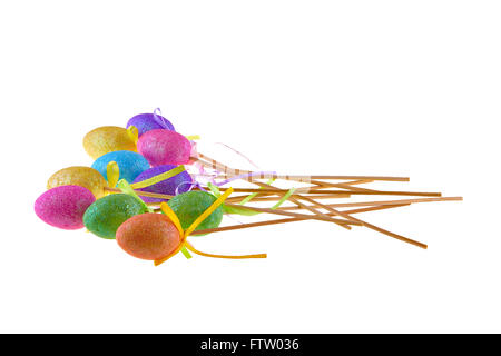 Colorful easter eggs on sticks isolated white Stock Photo