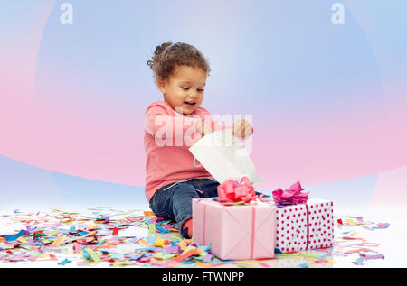 happy little baby girl with birthday presents Stock Photo