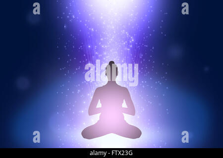 Silhouette of  woman in yoga position Stock Photo