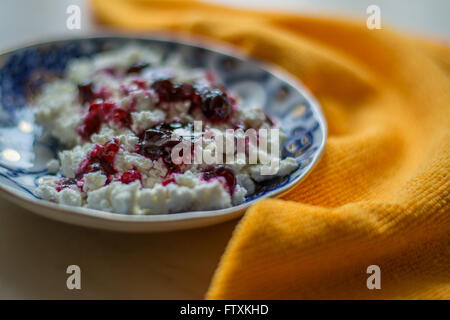 Cottage cheese with on wooden table, closeup Stock Photo