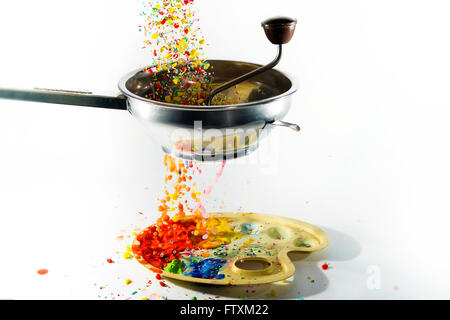 Conceptual food being pureed through a moulin Stock Photo