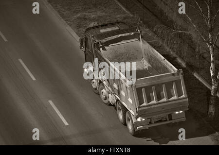 Empty dump-truck in the night viewed  from above Stock Photo