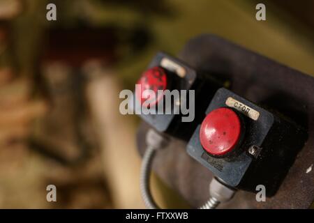 Machine control panel with two red buttons Stock Photo