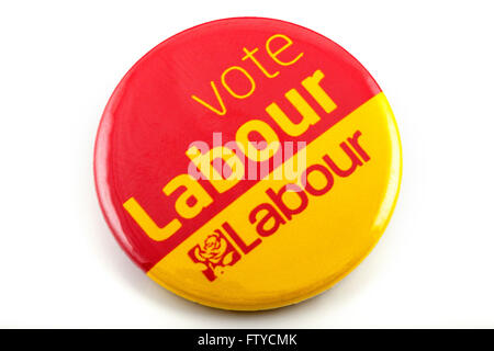LONDON, UK - MARCH 3RD 2016: A VOTE LABOUR pin badge over a white background, on 3rd March 2016. Stock Photo