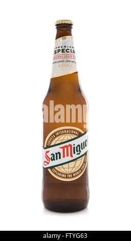 Bottle of San Miguel Beer on a white background, The original San Miguel Brewery was founded in 189 Stock Photo