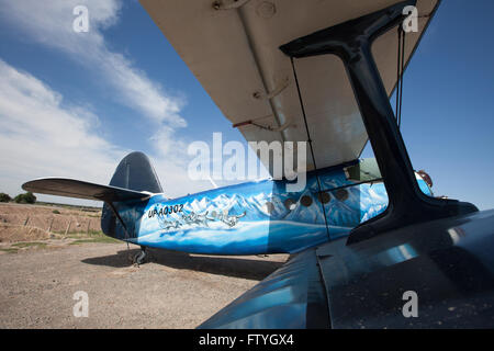 Kazakhstan, Kazakistan, Asia, landed agriculture airplane, biplane. Stock Photo