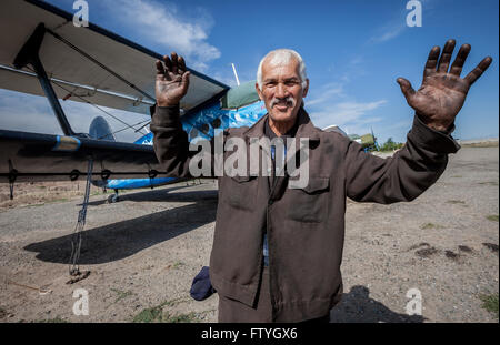 Kazakhstan, Kazakistan, Asia, a mechanic in front of the airplane for aerial agriculture. Stock Photo