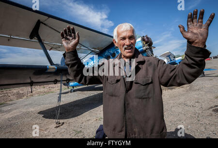 Kazakhstan, Kazakistan, Asia, a mechanic in front of the airplane for aerial agriculture. Stock Photo